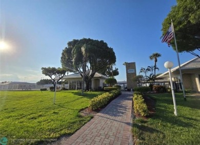 Beautiful Leisureville Condo 55+ community. 1st Floor No Land on Leisureville Community Association in Florida - for sale on GolfHomes.com, golf home, golf lot