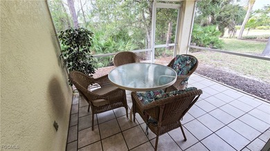 Bright and spacious well-appointed 2-bedroom, 2-bath end-unit on Burnt Store Golf Club in Florida - for sale on GolfHomes.com, golf home, golf lot