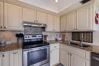 An abundance of natural light and updates in this welcoming on Isla Del Sol Yacht and Country Club in Florida - for sale on GolfHomes.com, golf home, golf lot