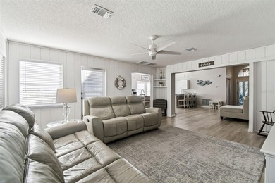 Welcome to this stunning, FULLY-REMODELED home located on a on Meadow Oaks Golf and Country Club in Florida - for sale on GolfHomes.com, golf home, golf lot