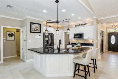 Beautifully updated and meticulously maintained lake front home on Tiger Point Golf and Country Club in Florida - for sale on GolfHomes.com, golf home, golf lot