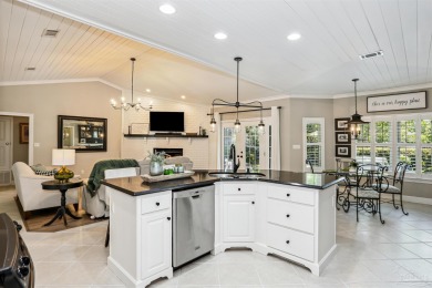 Beautifully updated and meticulously maintained lake front home on Tiger Point Golf and Country Club in Florida - for sale on GolfHomes.com, golf home, golf lot