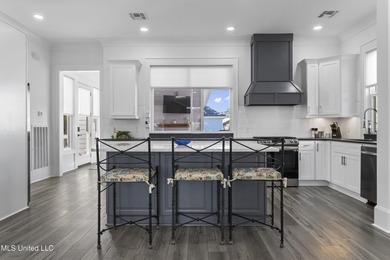 Your Perfect Coastal retreat! Steps from the beach, and easy on Pass Christian Isles Golf Club in Mississippi - for sale on GolfHomes.com, golf home, golf lot