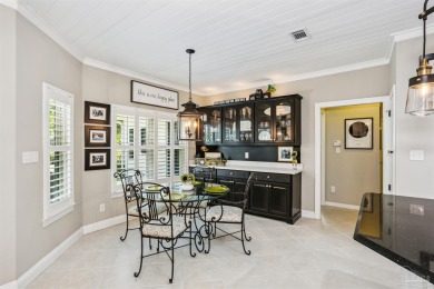 Beautifully updated and meticulously maintained lake front home on Tiger Point Golf and Country Club in Florida - for sale on GolfHomes.com, golf home, golf lot