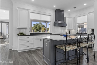 Your Perfect Coastal retreat! Steps from the beach, and easy on Pass Christian Isles Golf Club in Mississippi - for sale on GolfHomes.com, golf home, golf lot