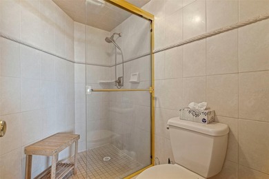 An abundance of natural light and updates in this welcoming on Isla Del Sol Yacht and Country Club in Florida - for sale on GolfHomes.com, golf home, golf lot