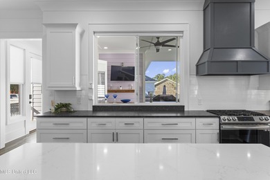 Your Perfect Coastal retreat! Steps from the beach, and easy on Pass Christian Isles Golf Club in Mississippi - for sale on GolfHomes.com, golf home, golf lot