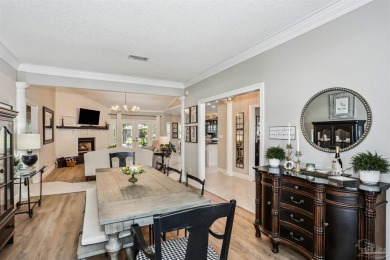 Beautifully updated and meticulously maintained lake front home on Tiger Point Golf and Country Club in Florida - for sale on GolfHomes.com, golf home, golf lot