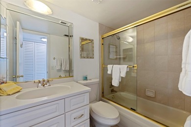 An abundance of natural light and updates in this welcoming on Isla Del Sol Yacht and Country Club in Florida - for sale on GolfHomes.com, golf home, golf lot