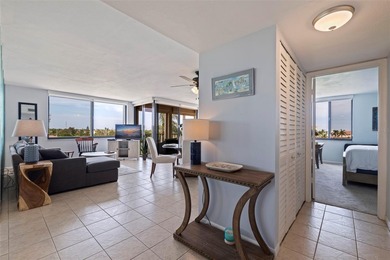 An abundance of natural light and updates in this welcoming on Isla Del Sol Yacht and Country Club in Florida - for sale on GolfHomes.com, golf home, golf lot