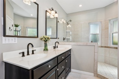 Beautifully updated and meticulously maintained lake front home on Tiger Point Golf and Country Club in Florida - for sale on GolfHomes.com, golf home, golf lot
