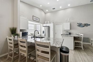 Welcome to this stunning, FULLY-REMODELED home located on a on Meadow Oaks Golf and Country Club in Florida - for sale on GolfHomes.com, golf home, golf lot