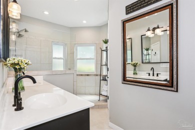 Beautifully updated and meticulously maintained lake front home on Tiger Point Golf and Country Club in Florida - for sale on GolfHomes.com, golf home, golf lot