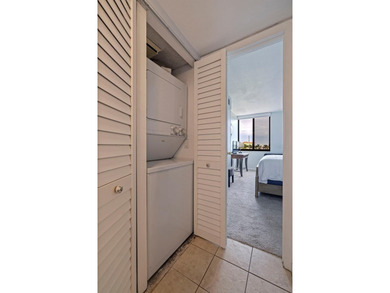 An abundance of natural light and updates in this welcoming on Isla Del Sol Yacht and Country Club in Florida - for sale on GolfHomes.com, golf home, golf lot