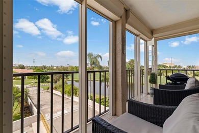 An abundance of natural light and updates in this welcoming on Isla Del Sol Yacht and Country Club in Florida - for sale on GolfHomes.com, golf home, golf lot