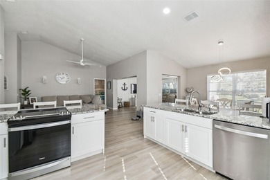 Welcome to this stunning, FULLY-REMODELED home located on a on Meadow Oaks Golf and Country Club in Florida - for sale on GolfHomes.com, golf home, golf lot