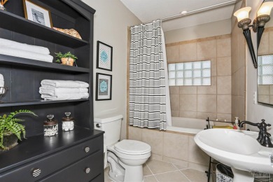 Beautifully updated and meticulously maintained lake front home on Tiger Point Golf and Country Club in Florida - for sale on GolfHomes.com, golf home, golf lot