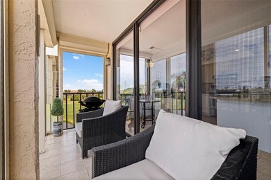 An abundance of natural light and updates in this welcoming on Isla Del Sol Yacht and Country Club in Florida - for sale on GolfHomes.com, golf home, golf lot