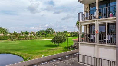 An abundance of natural light and updates in this welcoming on Isla Del Sol Yacht and Country Club in Florida - for sale on GolfHomes.com, golf home, golf lot