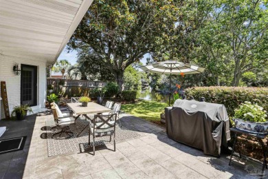 Beautifully updated and meticulously maintained lake front home on Tiger Point Golf and Country Club in Florida - for sale on GolfHomes.com, golf home, golf lot