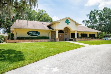 Welcome to this stunning, FULLY-REMODELED home located on a on Meadow Oaks Golf and Country Club in Florida - for sale on GolfHomes.com, golf home, golf lot
