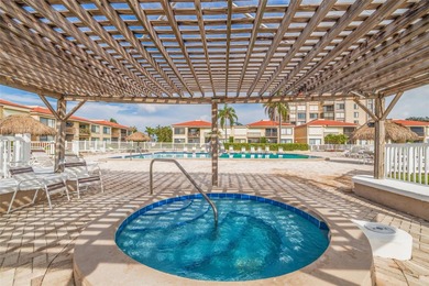 An abundance of natural light and updates in this welcoming on Isla Del Sol Yacht and Country Club in Florida - for sale on GolfHomes.com, golf home, golf lot