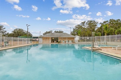 Welcome to this stunning, FULLY-REMODELED home located on a on Meadow Oaks Golf and Country Club in Florida - for sale on GolfHomes.com, golf home, golf lot