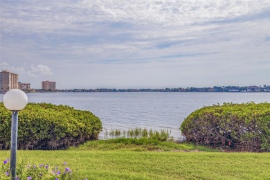 An abundance of natural light and updates in this welcoming on Isla Del Sol Yacht and Country Club in Florida - for sale on GolfHomes.com, golf home, golf lot
