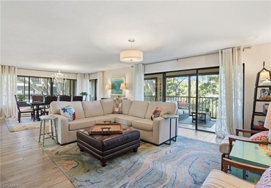 Tucked within the lush, coastal community of the Sanctuary at on Club at Pelican Bay Golf Course in Florida - for sale on GolfHomes.com, golf home, golf lot