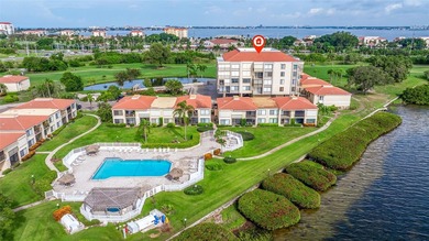 An abundance of natural light and updates in this welcoming on Isla Del Sol Yacht and Country Club in Florida - for sale on GolfHomes.com, golf home, golf lot