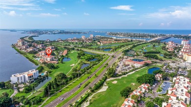An abundance of natural light and updates in this welcoming on Isla Del Sol Yacht and Country Club in Florida - for sale on GolfHomes.com, golf home, golf lot
