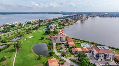 An abundance of natural light and updates in this welcoming on Isla Del Sol Yacht and Country Club in Florida - for sale on GolfHomes.com, golf home, golf lot