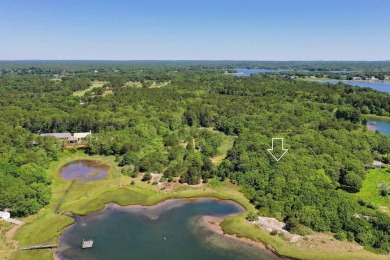 Enjoy sweeping scenic water views from this 2.27-acre buildable on Oyster Harbors Club in Massachusetts - for sale on GolfHomes.com, golf home, golf lot