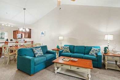 This furnished third-floor two-bedroom, two-bathroom condo is on Barefoot Resort and Golf Club  in South Carolina - for sale on GolfHomes.com, golf home, golf lot