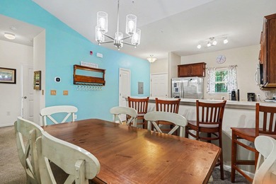 This furnished third-floor two-bedroom, two-bathroom condo is on Barefoot Resort and Golf Club  in South Carolina - for sale on GolfHomes.com, golf home, golf lot