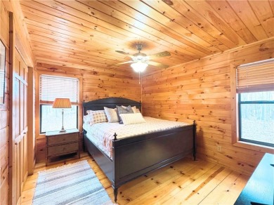 Nestled atop a gentle hill and surrounded by graceful Hemlocks on White Path Golf Club in Georgia - for sale on GolfHomes.com, golf home, golf lot