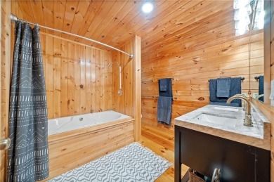 Nestled atop a gentle hill and surrounded by graceful Hemlocks on White Path Golf Club in Georgia - for sale on GolfHomes.com, golf home, golf lot