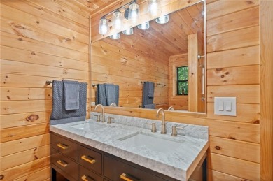 Nestled atop a gentle hill and surrounded by graceful Hemlocks on White Path Golf Club in Georgia - for sale on GolfHomes.com, golf home, golf lot
