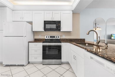 When you enter this 3rd floor 2 BR 2BA condo in MUIRFIELD @ on Golfview Golf and Racquet Club in Florida - for sale on GolfHomes.com, golf home, golf lot