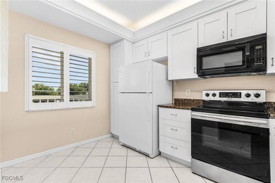 When you enter this 3rd floor 2 BR 2BA condo in MUIRFIELD @ on Golfview Golf and Racquet Club in Florida - for sale on GolfHomes.com, golf home, golf lot