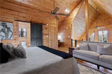 Nestled atop a gentle hill and surrounded by graceful Hemlocks on White Path Golf Club in Georgia - for sale on GolfHomes.com, golf home, golf lot