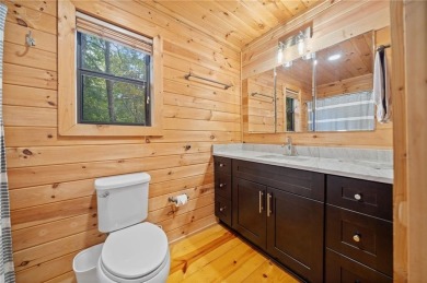 Nestled atop a gentle hill and surrounded by graceful Hemlocks on White Path Golf Club in Georgia - for sale on GolfHomes.com, golf home, golf lot