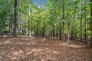 Nestled atop a gentle hill and surrounded by graceful Hemlocks on White Path Golf Club in Georgia - for sale on GolfHomes.com, golf home, golf lot