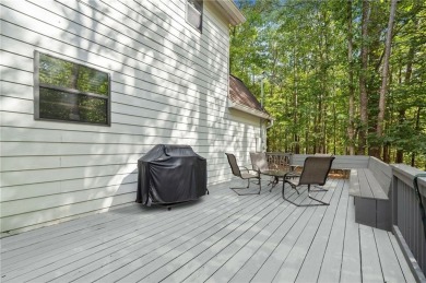 Nestled atop a gentle hill and surrounded by graceful Hemlocks on White Path Golf Club in Georgia - for sale on GolfHomes.com, golf home, golf lot