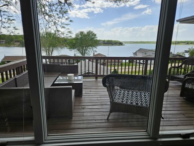 Welcome to your perfect retreat in the highly desirable Lake on Lake Carroll Golf Course in Illinois - for sale on GolfHomes.com, golf home, golf lot
