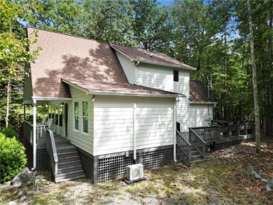 Nestled atop a gentle hill and surrounded by graceful Hemlocks on White Path Golf Club in Georgia - for sale on GolfHomes.com, golf home, golf lot