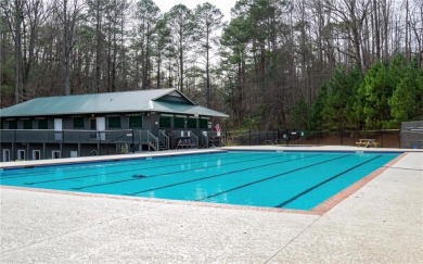 Nestled atop a gentle hill and surrounded by graceful Hemlocks on White Path Golf Club in Georgia - for sale on GolfHomes.com, golf home, golf lot