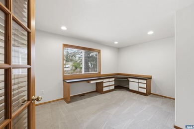 Peaceful Sunland golf course retreat with single-level living in on SunLand Golf and Country Club in Washington - for sale on GolfHomes.com, golf home, golf lot