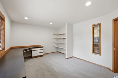 Peaceful Sunland golf course retreat with single-level living in on SunLand Golf and Country Club in Washington - for sale on GolfHomes.com, golf home, golf lot