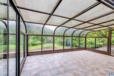 Peaceful Sunland golf course retreat with single-level living in on SunLand Golf and Country Club in Washington - for sale on GolfHomes.com, golf home, golf lot